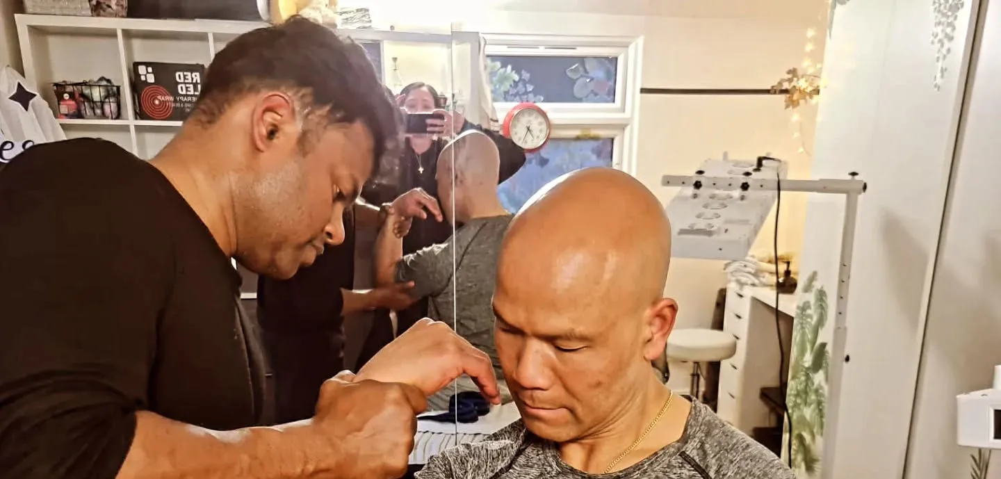 Master Wong receiving a recovery treatment